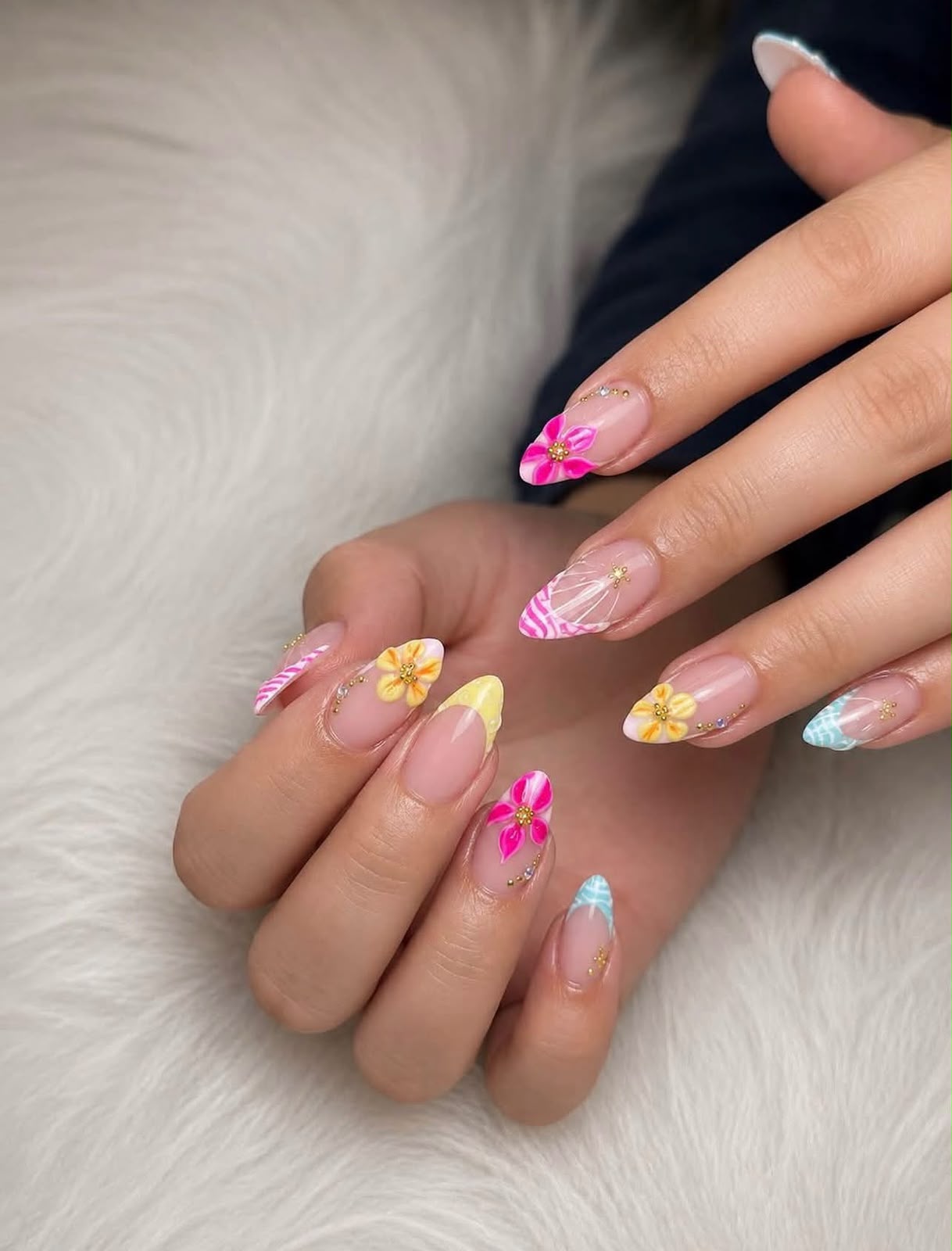 Colourful floral manicure created at Rushden Nails